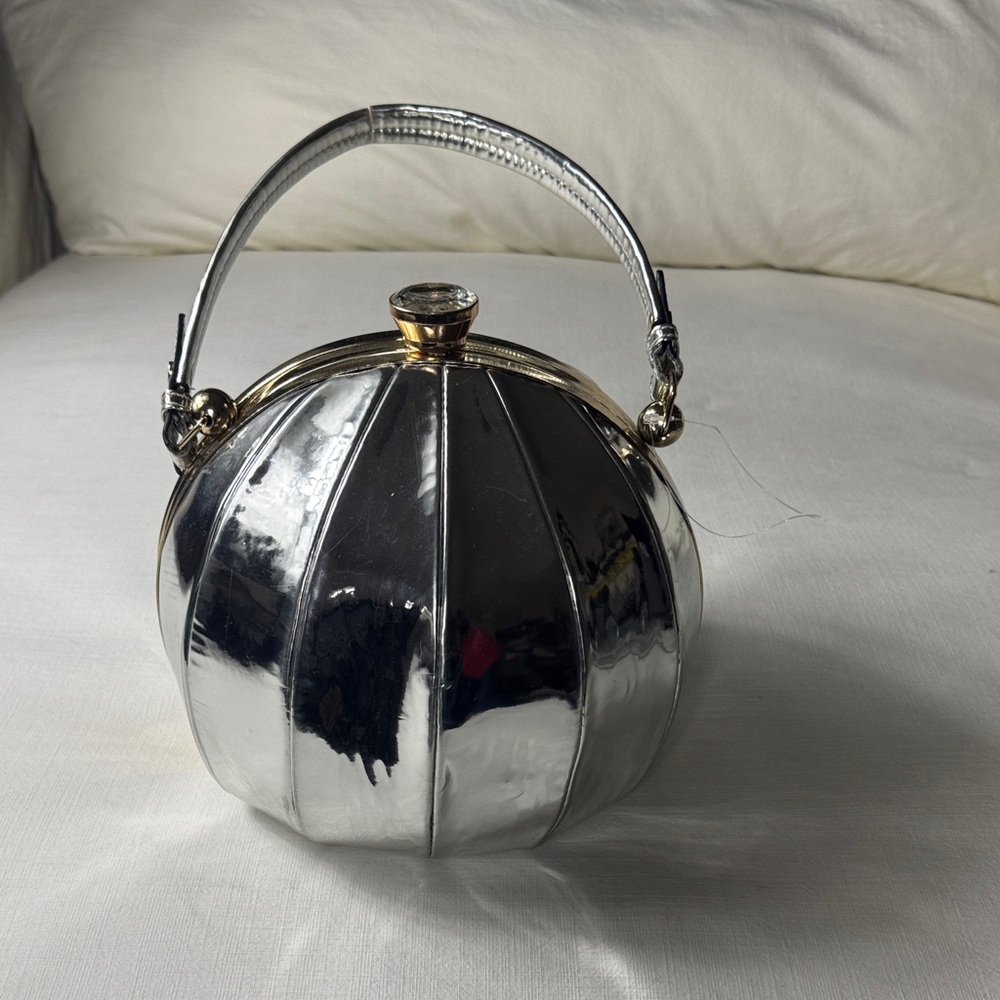 Metallic Silver Round Dome Wristlet Clutch